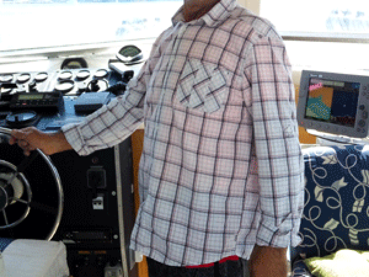 a man standing in front of a car